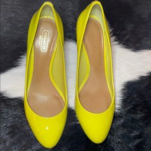 Size 8 Coach brand patent leather yellow pumps
